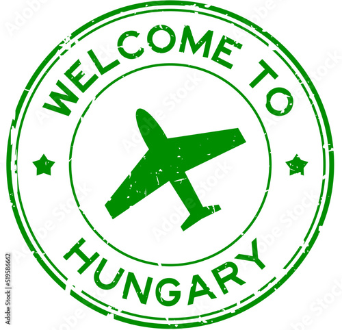 Photography Grunge green welcome to Hungary word with airplane icon round rubber seal stamp