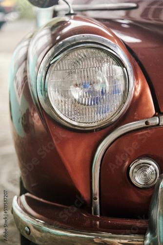 Kandy, Sri Lanka - 20.02.2022: The headlight of an old retro car