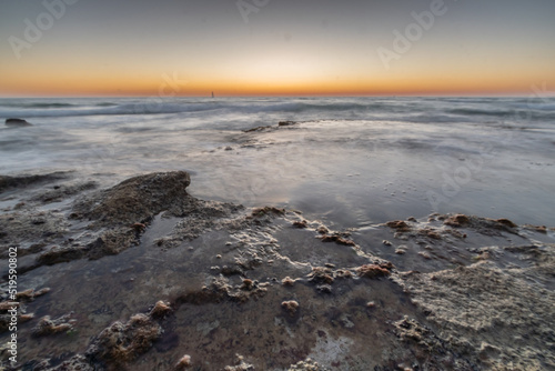 sunset on the rocky beach Tel Aviv Israel