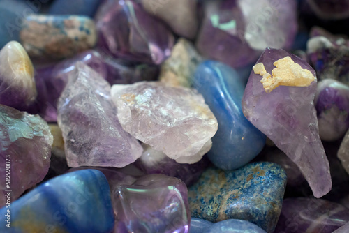 Polished stones for sale in a small store in Upstate NY.  Shiny rocks are sold by the pound in a store in Woodstock. photo