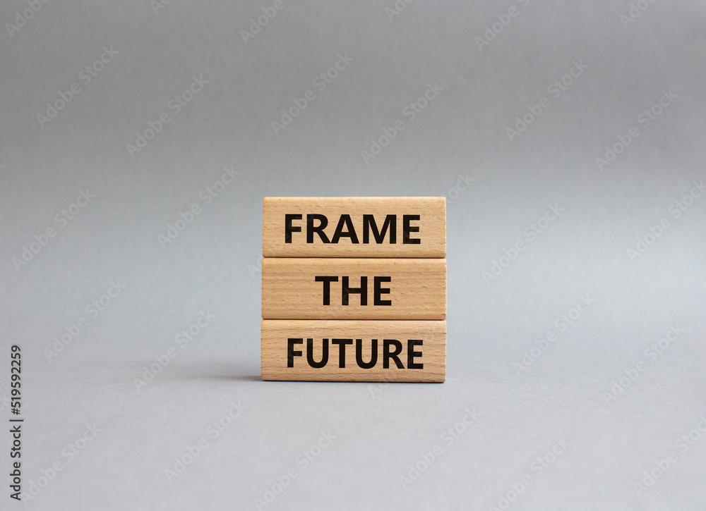 Frame the future symbol. Wooden blocks with words Frame the future. Beautiful grey background. Business and Frame the future concept. Copy space. Frame the future symbol. Wooden blocks with words Frame the future. Beautiful grey background. Business and Frame the future concept. Copy space.