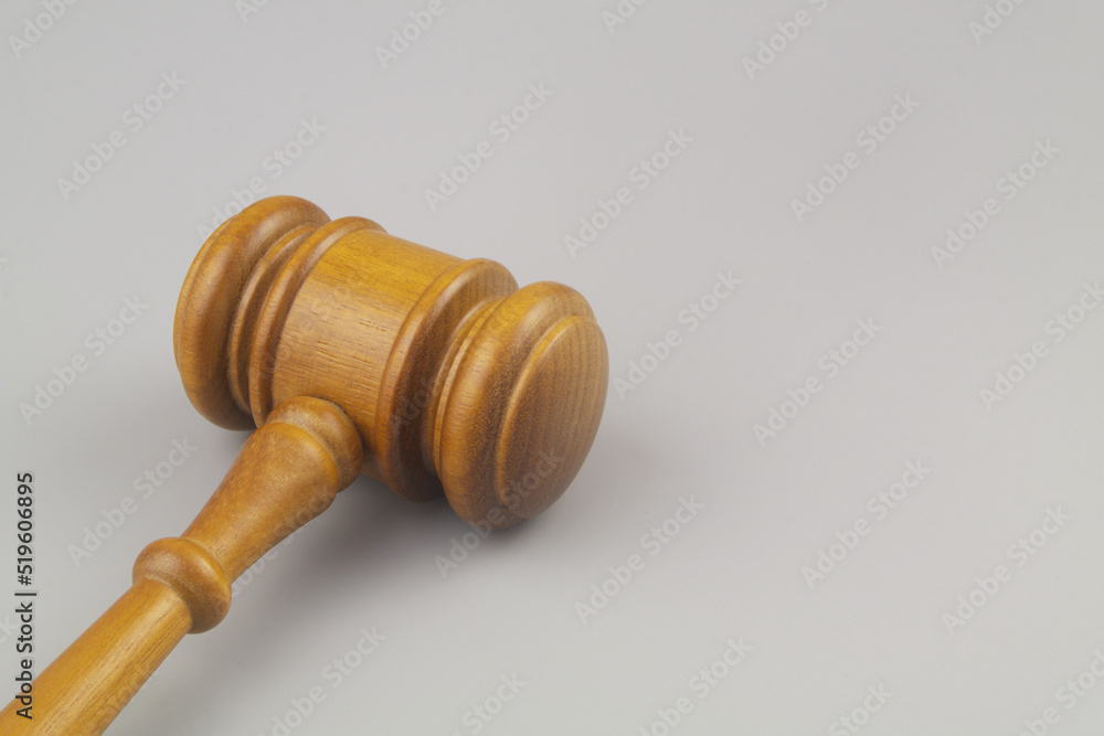 Judge's gavel on gray background, space for text