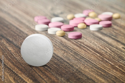 Set of pills drug on desk background