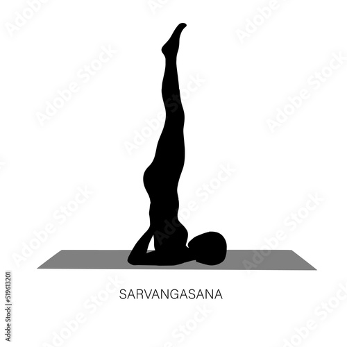 Yogi woman in Salamba Sarvangasana or shoulder stand pose.