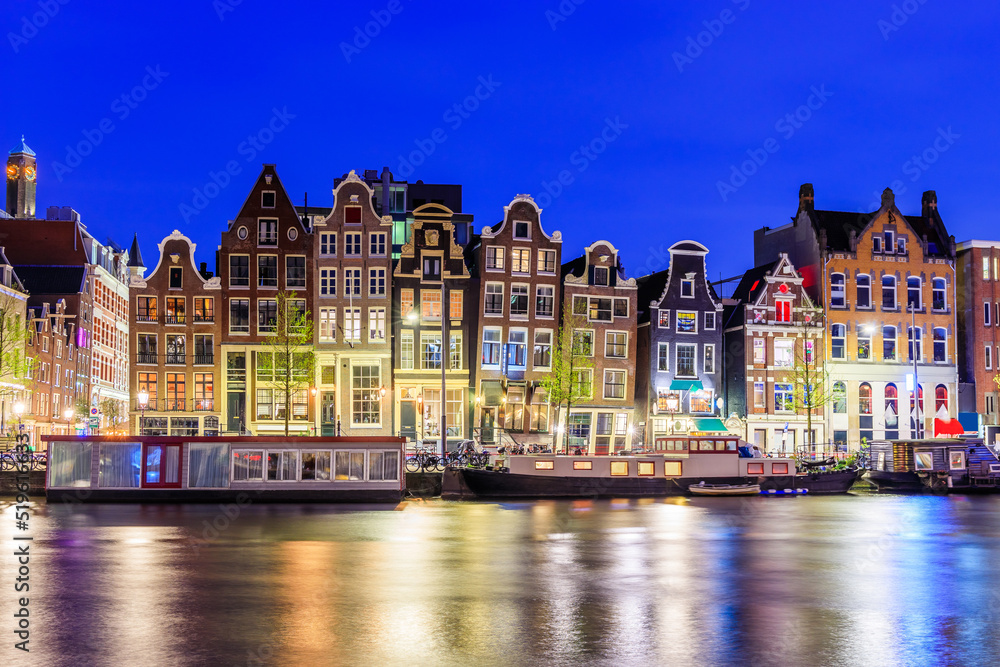 Fototapeta premium Amsterdam, Netherlands. Colorful dancing houses.