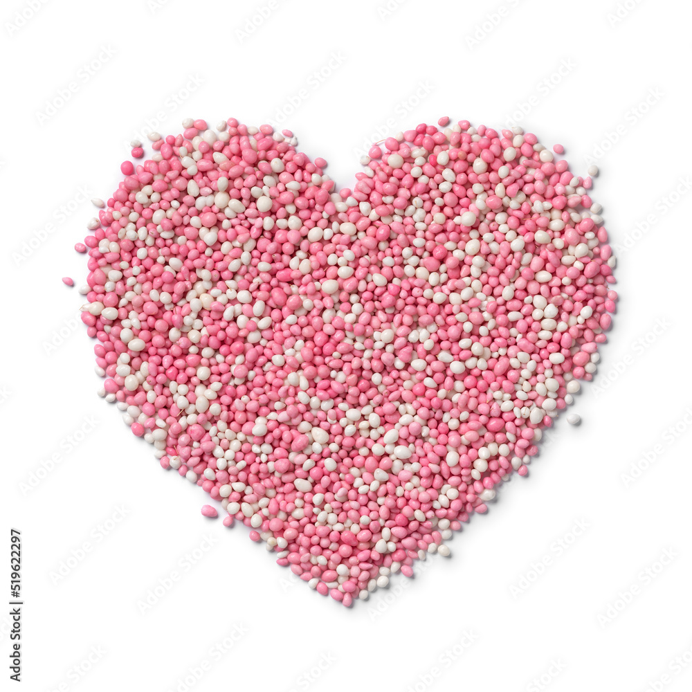 Traditional Dutch pink anise sprinkles in heart shape isolated on white background