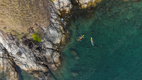 Top view of canoe. people boating in the sea.