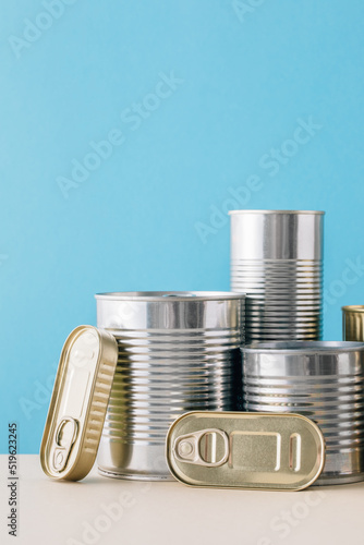Set of stacked unopened cans