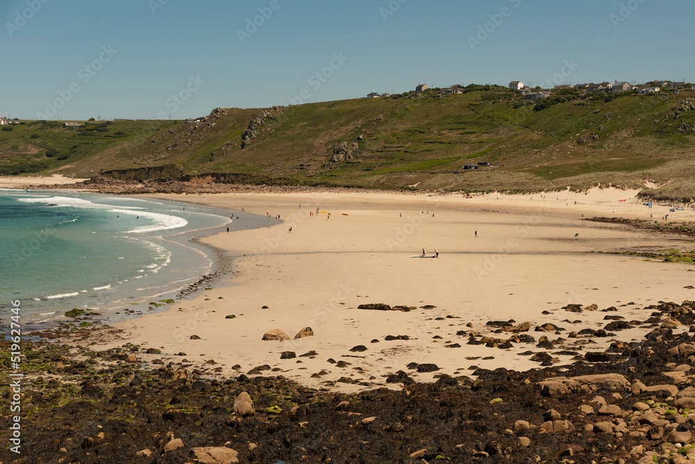 Sennen Cove, Cornwall, England, UK. 2022. Sennen Cove beach at low tide on a sunny day with clear blue sky in west Cornwall, UK