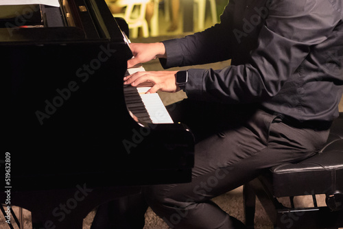 detail of man playing the piano, pianist