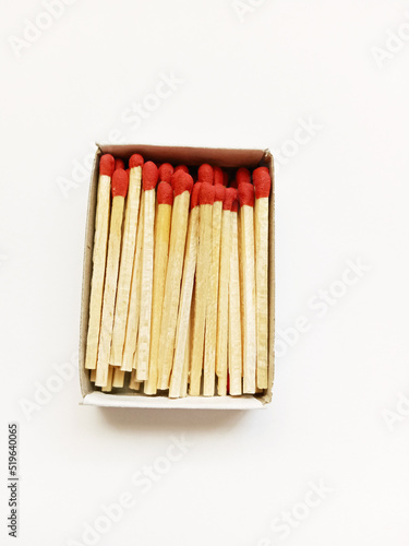 Matches in a box on white background