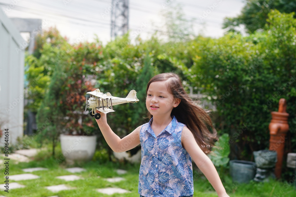 Child Play With Airplane outdoor - Imagination And Freedom Concept Child Play With Airplane outdoor - Imagination And Freedom Concept
