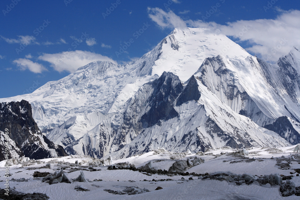 Fototapeta premium Mitre Peak (6010 meters) and frozen Baltoro Glacier are seen from Godwin Austin Glacier near K2 Basecamp in Karakoram Range.Mitre peak is a neighboring peak of some of the highest mountains on earth