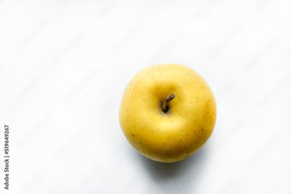 Yellow sweet apple on a white background Yellow sweet apple on a white background