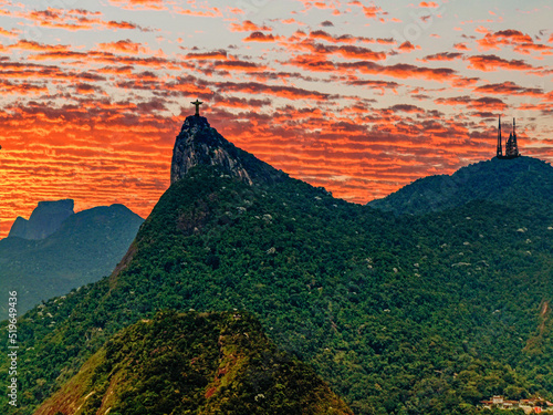 Corcovado Mountain and Christ Redemptor Statue after sunset, it is the principal touristic hotspot in Brazil. Rio de Janeiro, July 2019  photo