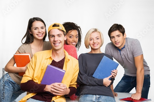 Group of multiracial people enjoy day. Diverse young friedns having fun outdoor photo