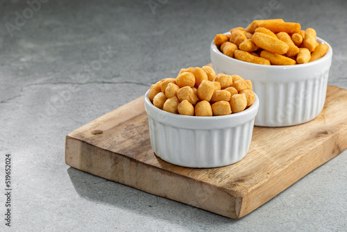Snacks in ramekin on the table.