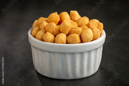 Snacks in ramekin on the table.