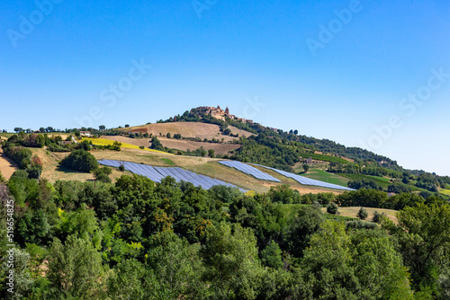 Solarcells on the green hills of the village of Montedinove on a altitude of 561 m in the Italian Marche region.