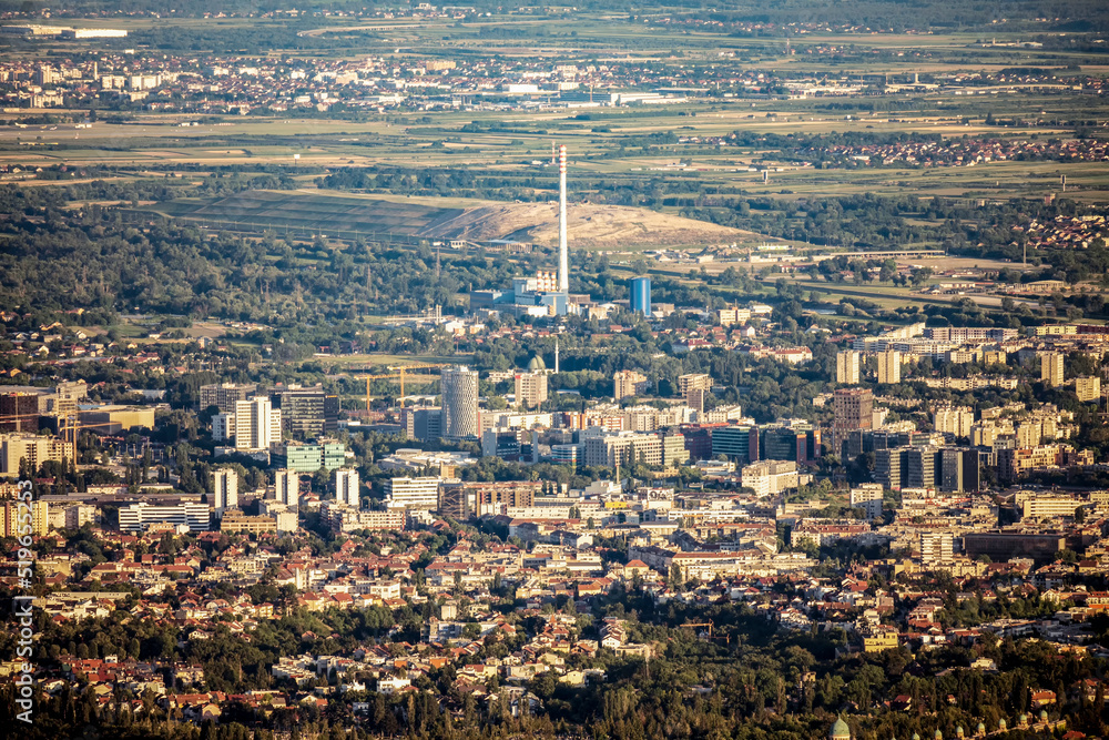 Aerial view of Zagreb city from above, with numerous landmarks visible in the distance