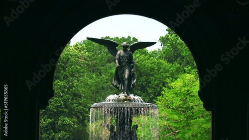 The Bethesda Fountain continuously drips water to basin, among green trees beyond the arch of the Bethesda Terrace at Central Park, amid a heat wave on July 24, 2022 in New York City. The heat wave co