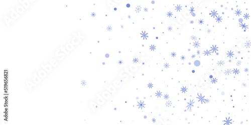 Blue delicate openwork snowflakes scatter on a white background. Festive background, postcard design, wallpaper