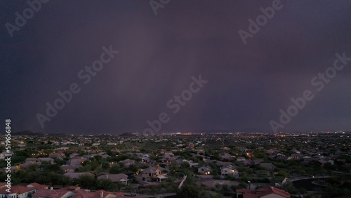 A monsoon storm moves over Mesa Arizona during the summer rainy season. photo