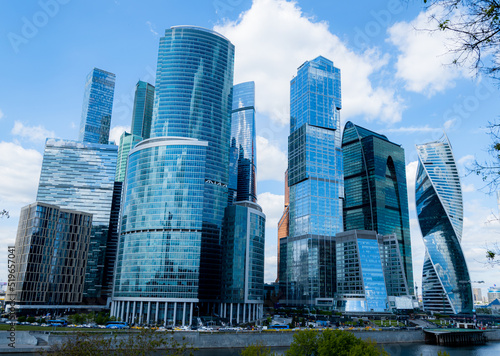 Moscow-City and Moscow-river area, Russia. modern architecture. Moscow City and skyscraper Moscow International Business Center in daytime against the blue sky with place for text