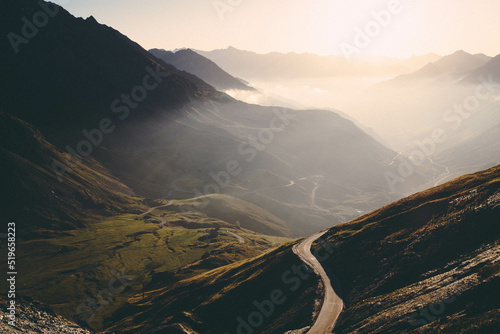 Quadro su tela Road uphill to the mountain Col du tourmalet in the pyrenees in south france in the sunset