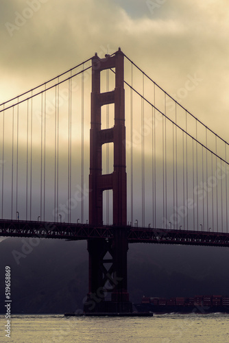Golden Gate bridge at sunset on a cloudy day #519658869