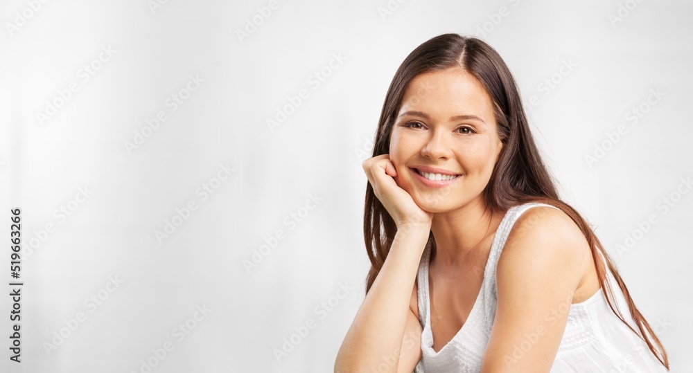 Portrait of beautiful young female or woman looking happy and confident. Concept: having a secret. Portrait of beautiful young female or woman looking happy and confident. Concept: having a secret.