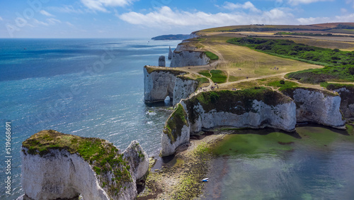 Old Harry Rocks are three chalk formations, including a stack and a stump, located at Handfast Point, on the Isle of Purbeck in Dorset, southern England. They mark the most eastern point of the Jurass