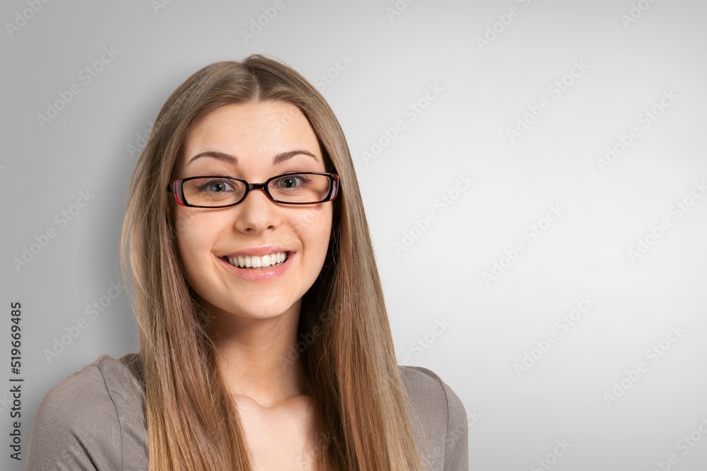 Portrait of beautiful young female or woman looking happy and confident. Concept: having a secret.