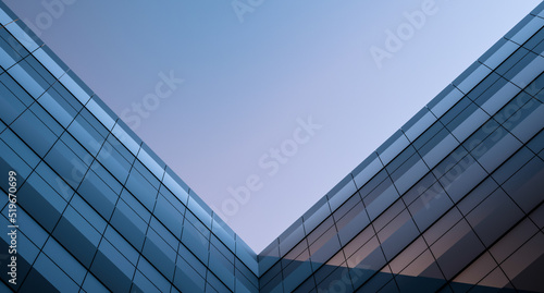 The architectural design is modern from blocks of geometric shapes. Walls made of concrete blocks with shadow. Building abstract design on the background of the sky.3D render.
