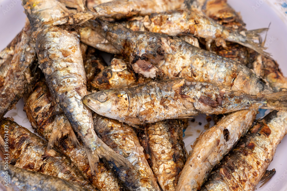 Selective focus, close-up view grilled sardines Selective focus, close-up view grilled sardines