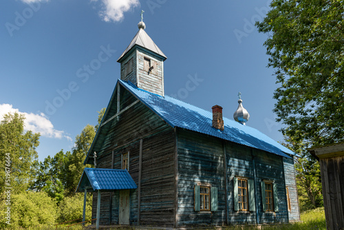 Fotobehang Rubeniski blue Old Believers Church in sunny summer day, Latvia.
