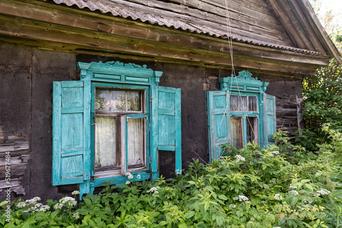 Very beautiful old, green wooden windows in abandoned house, Latgale, Latvia.