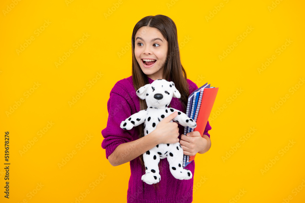 Funny school girl with toy. Happy childhood and kids education. Knowledge day. Funny school girl with toy. Happy childhood and kids education. Knowledge day.