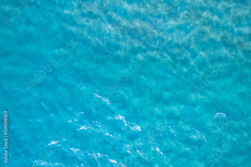 Fototapeta Naklejka Na Ścianę i Meble -  Sea surface aerial view water surface texture, Turquoise sea background Beautiful nature Amazing view seascape background