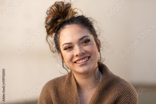 Young Filipino American woman smiling during thinking about her future _0149