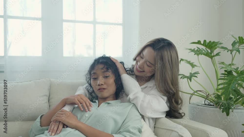 Holiday concept of 4k Resolution. Asian women embracing each other in the house. Young women are in a mutual lesbian love relationship. Holiday concept of 4k Resolution. Asian women embracing each other in the house. Young women are in a mutual lesbian love relationship.