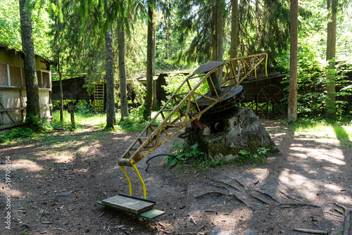Abandoned luge track in Murjani, Latvia. Old mechanism for sled training.