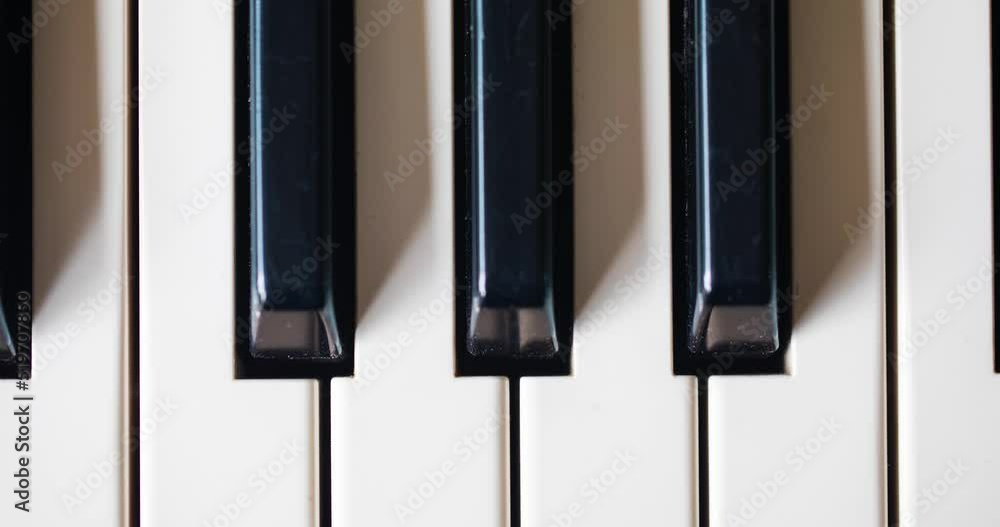 Close Up Overhead Shot Of Black And White Piano Keys. Musical Instrument. Close Up Overhead Shot Of Black And White Piano Keys. Musical Instrument.