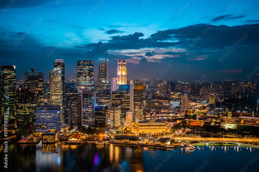 Obraz premium Singapore city skyline with modern skyscraper architecture building for concept of financial business and travel in Asia cityscape urban landmark, marina bay at night district dusk sky