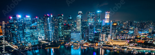 Fotografiet Singapore city skyline with modern skyscraper architecture building for concept