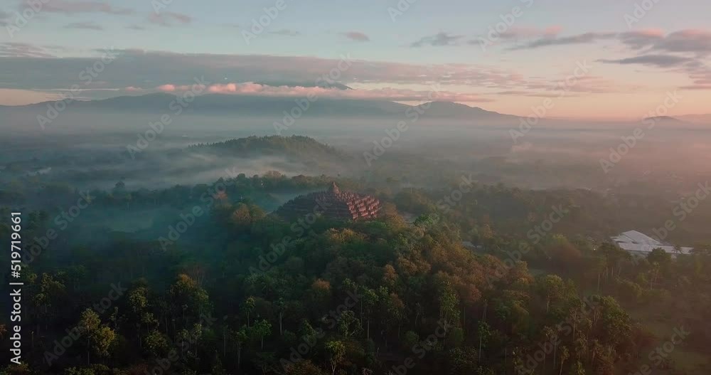 Cinematic shot of famous BOROBUDUR TEMPLE during Sunrise in the morning - Magelang,Indonesia Cinematic shot of famous BOROBUDUR TEMPLE during Sunrise in the morning - Magelang,Indonesia