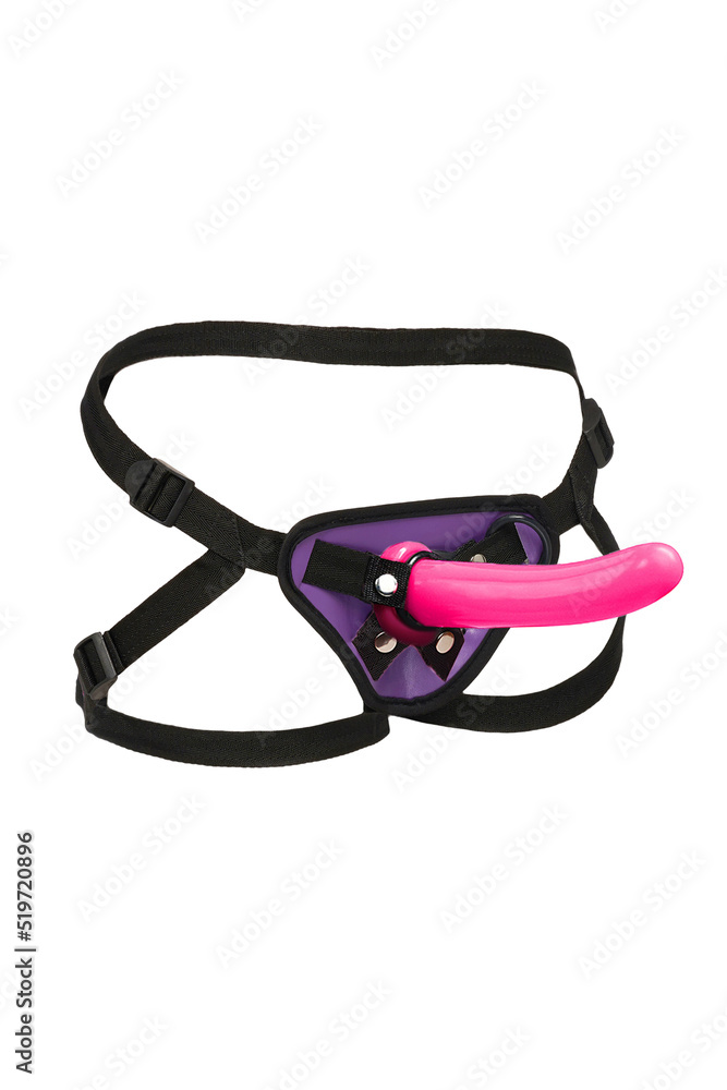 Close-up shot of purple leather strap on harness dildo panties with adjustable straps. The strap on dildo pants are isolated on a white background. Side view. Close-up shot of purple leather strap on harness dildo panties with adjustable straps. The strap on dildo pants are isolated on a white background. Side view.