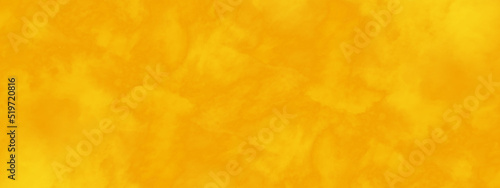 Faded and blurry orange or yellow background texture, bright and shinny yellow or orange watercolor shades grunge background with space, yellow or orange background for any design and wallpaper. 