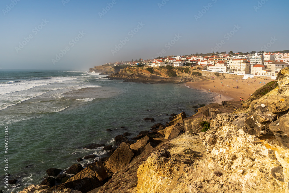 A shot with a view of Praia das Macas and the city on a hill. The eastern coast of Portugal