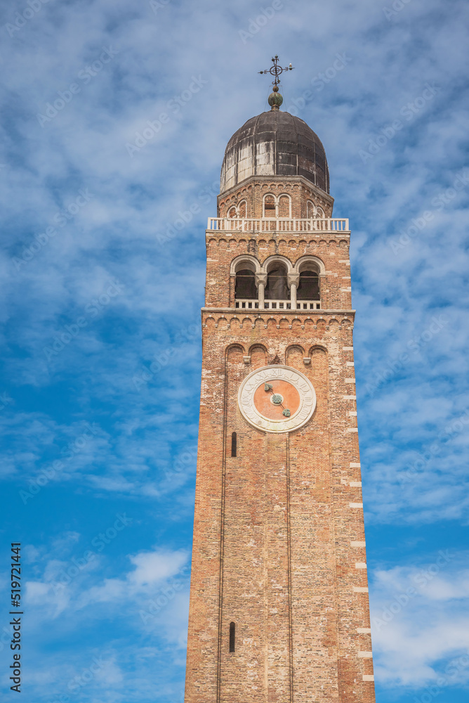 Chiesa Saint Andrea catholic church building with brick bell tower, Chioggia, Italy.